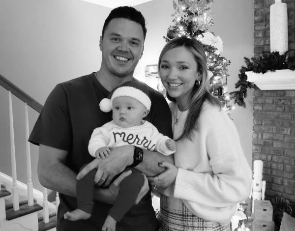 Macie Banks with her husband and daughter
